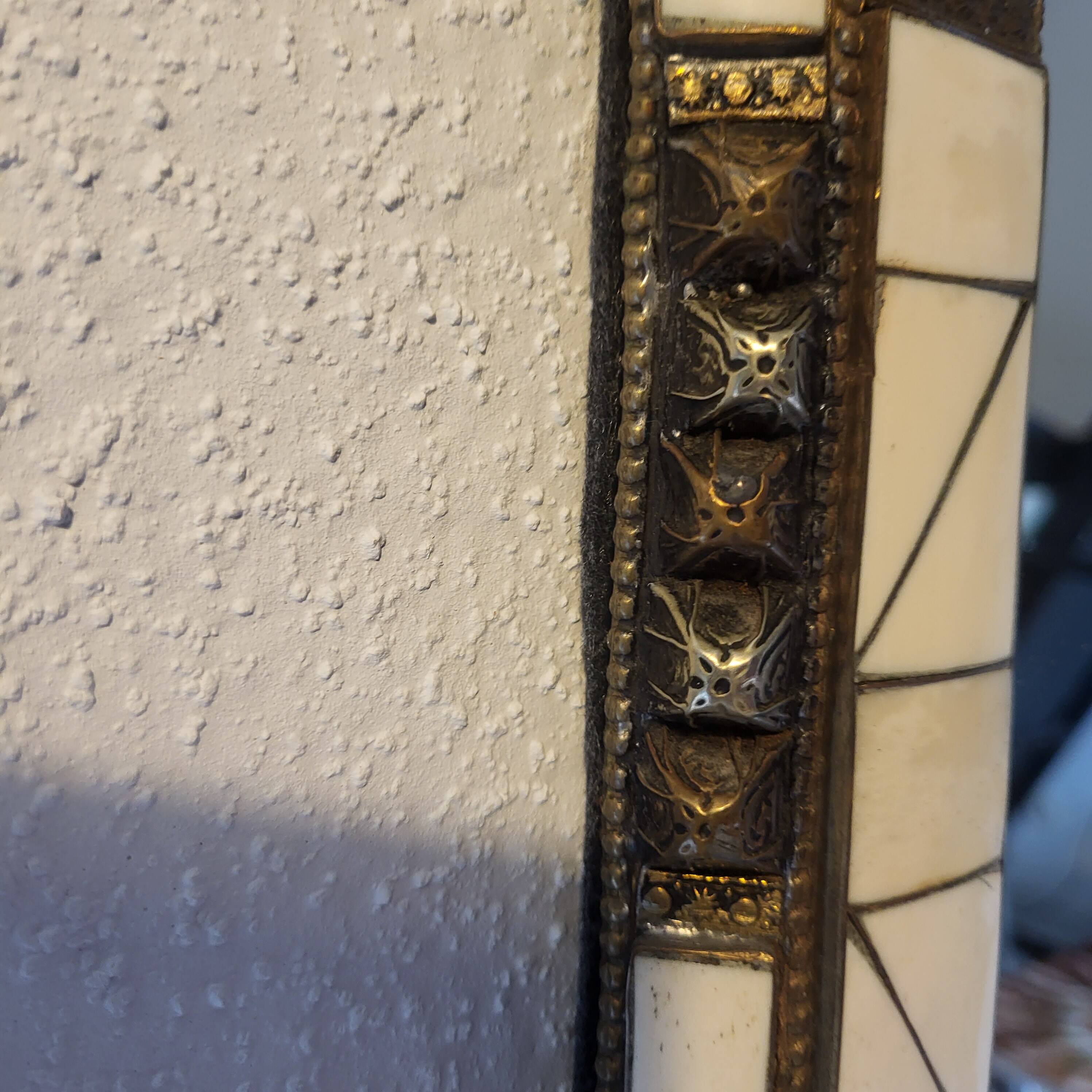 Ethnic bone and stone mirror