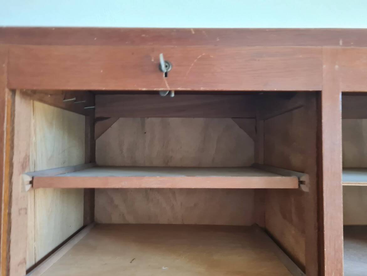 Vintage double curtain filing cabinet.