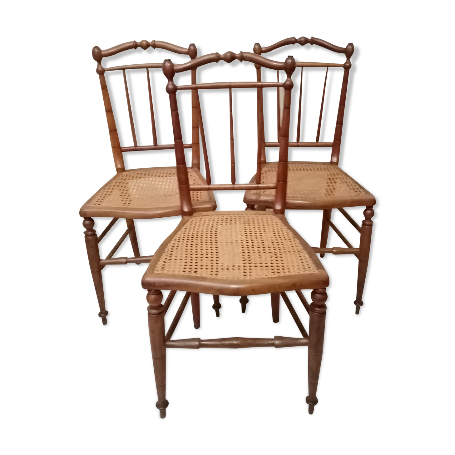 3 wooden and canning chairs