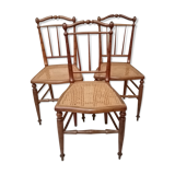 3 wooden and canning chairs