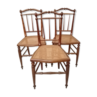 3 wooden and canning chairs