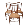 3 wooden and canning chairs