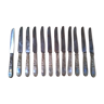 Twelve old silver metal knives, complete