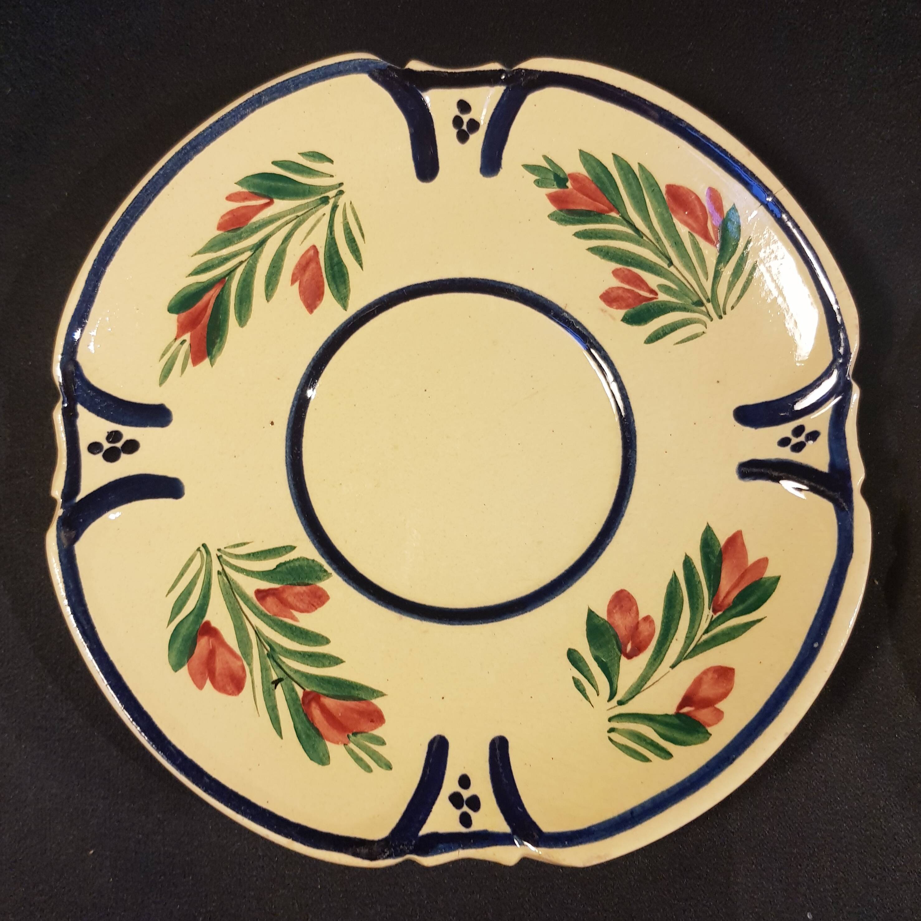 4 Quimper earthenware saucers or plates
