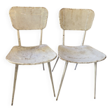 Pair of white metal chairs