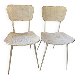 Pair of white metal chairs