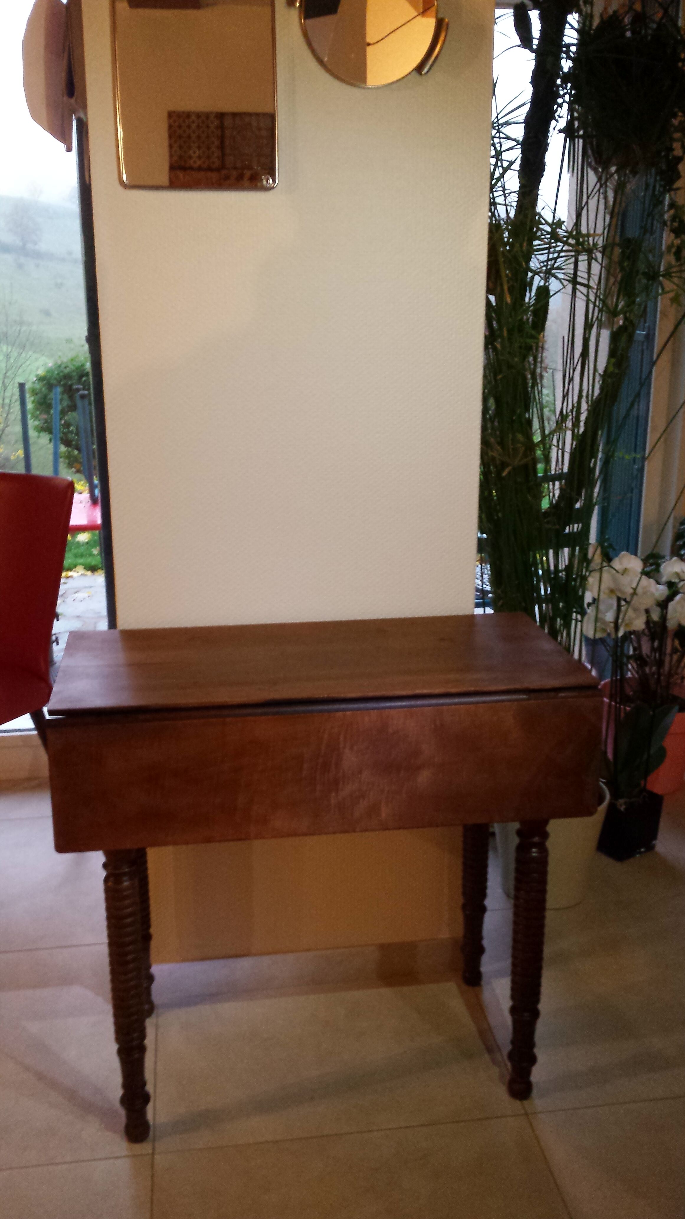 Wooden table with extensions