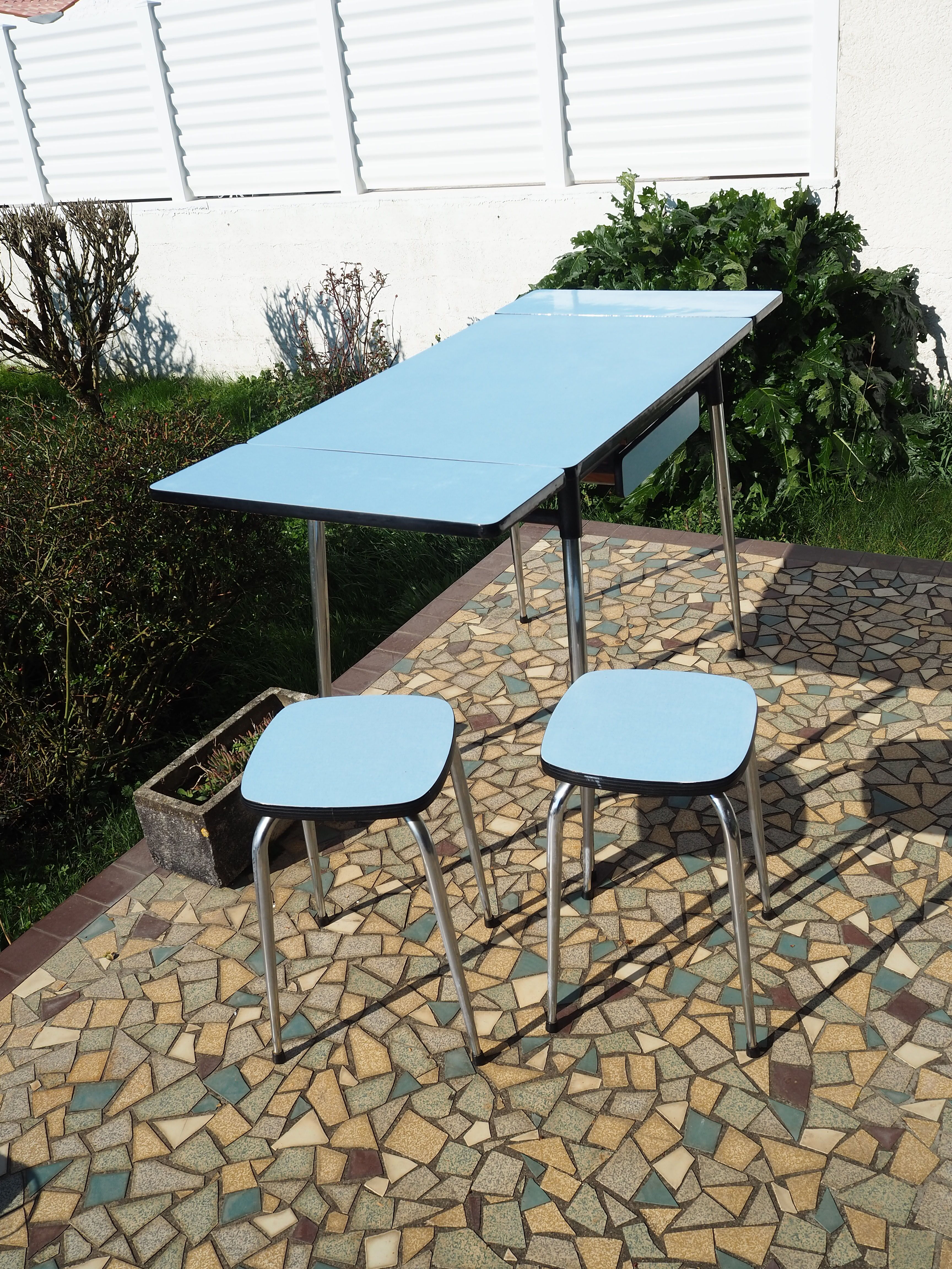 Blue formica table and two stools