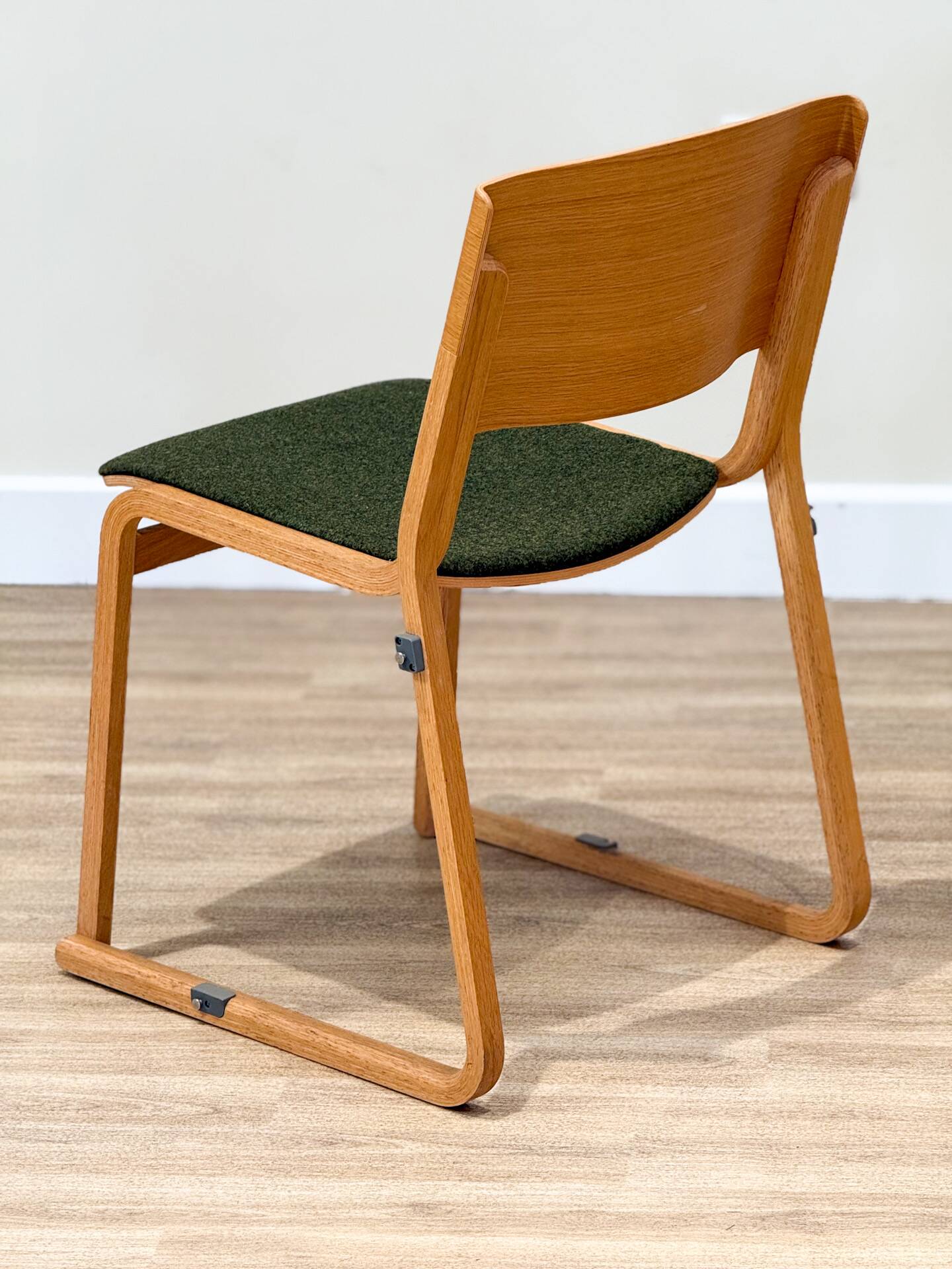 A set of four chairs in light oak (Theo chairs by Chorus)
