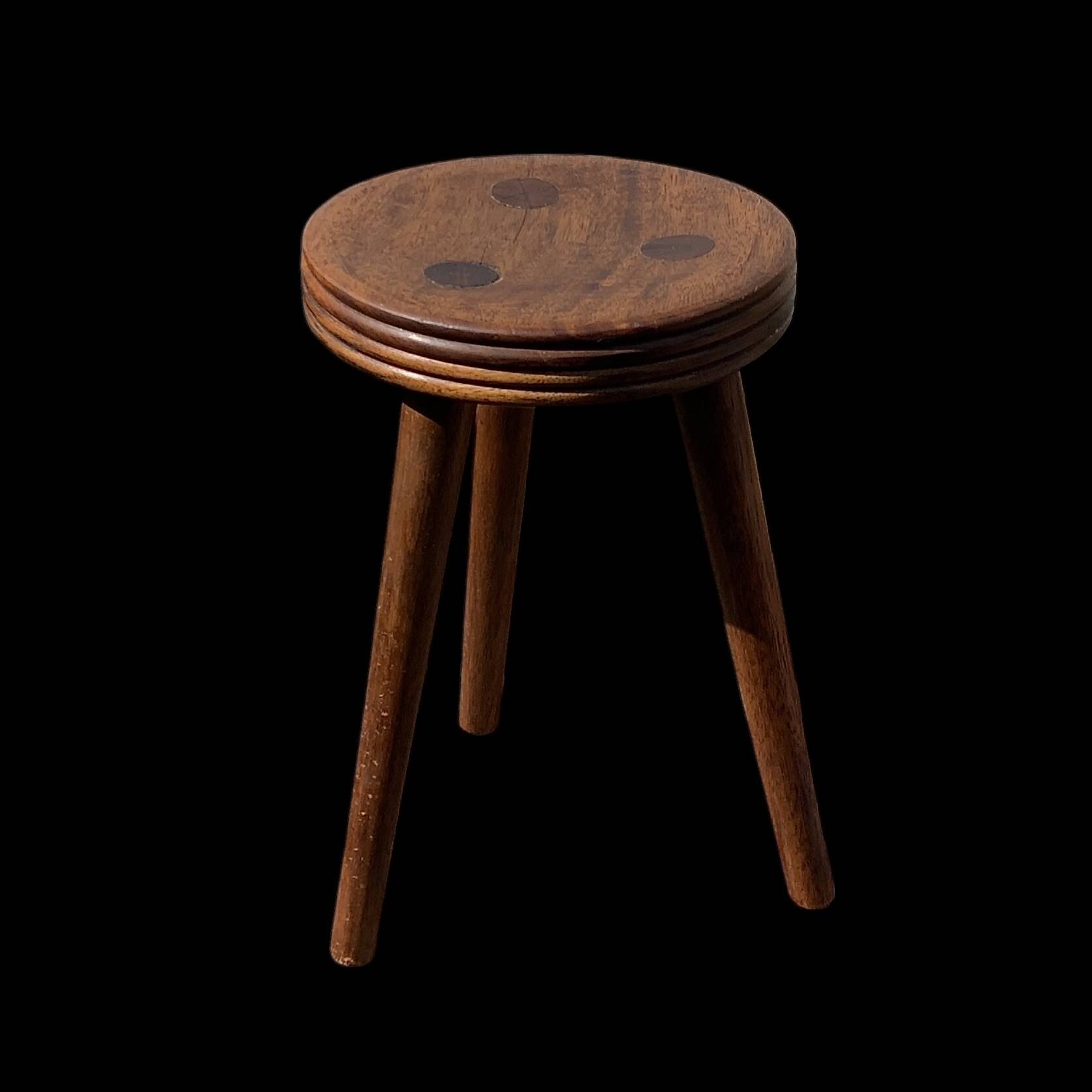 Old small wooden tripod stool