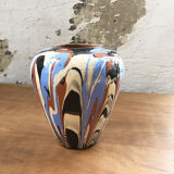 Vase dripping in varnished earth