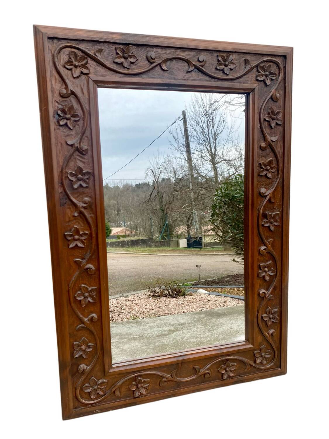 Two antique 19th century mirrors in carved Napoleon oak wood