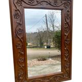 Two antique 19th century mirrors in carved Napoleon oak wood