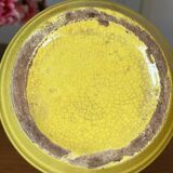 Old yellow ceramic pitcher