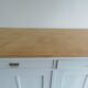 Vintage sideboard, 2 drawers, 1 shelf, 2 pearl gray patinated doors, wooden top.