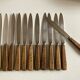 Set de 12 couteaux manches en bois d'olivier 1960