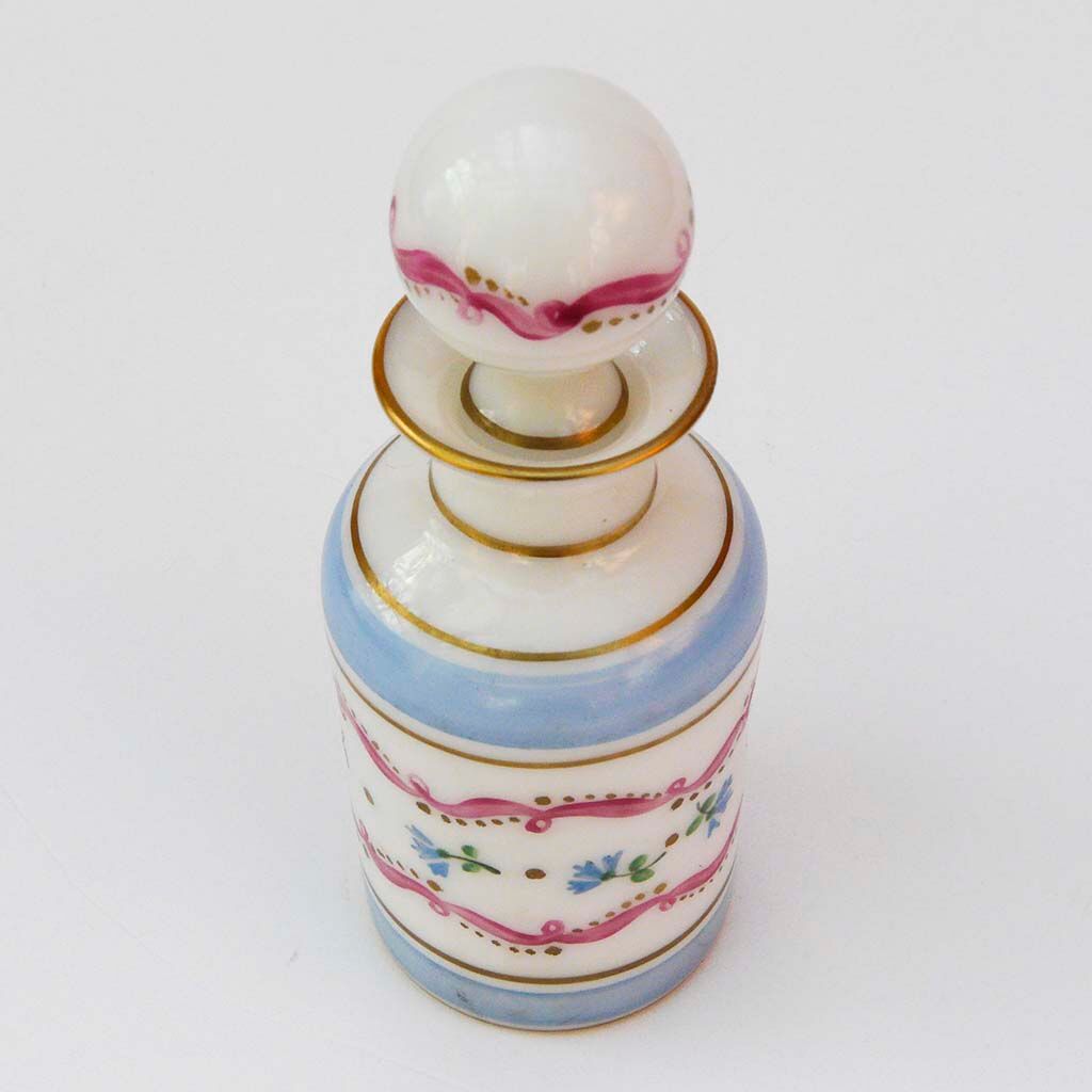 Bottle with floral decoration and antique gold edging