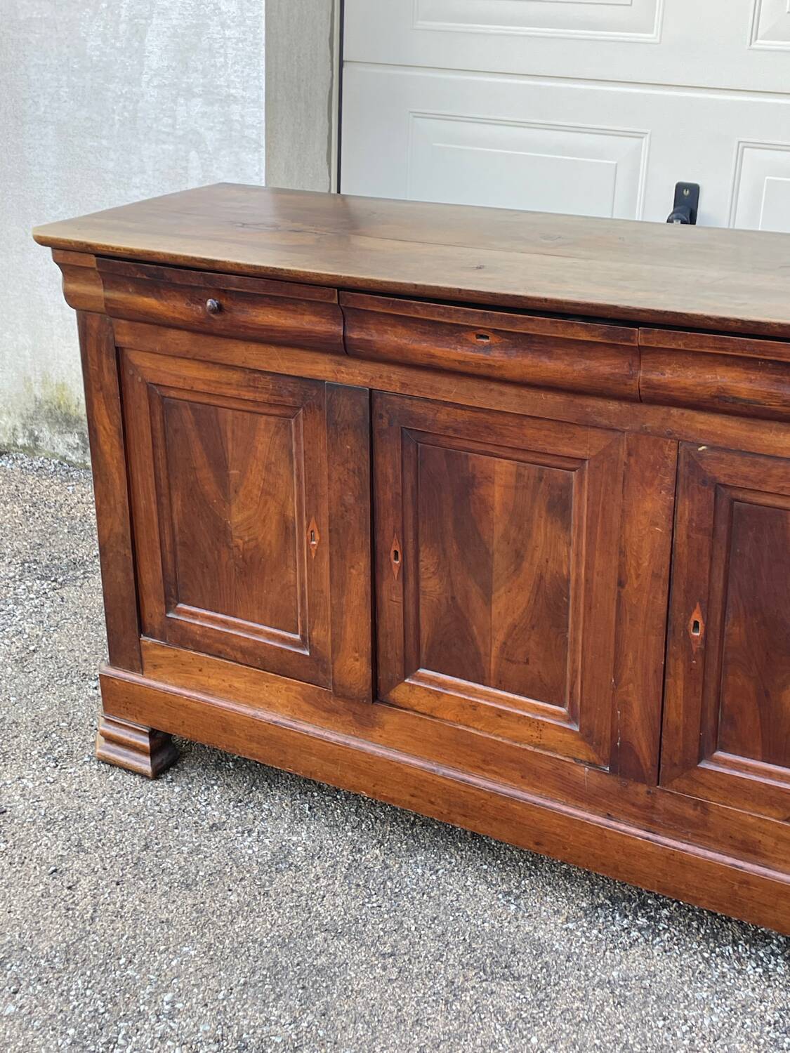 Walnut sideboard, Louis Philippe style, three doors, three shelves