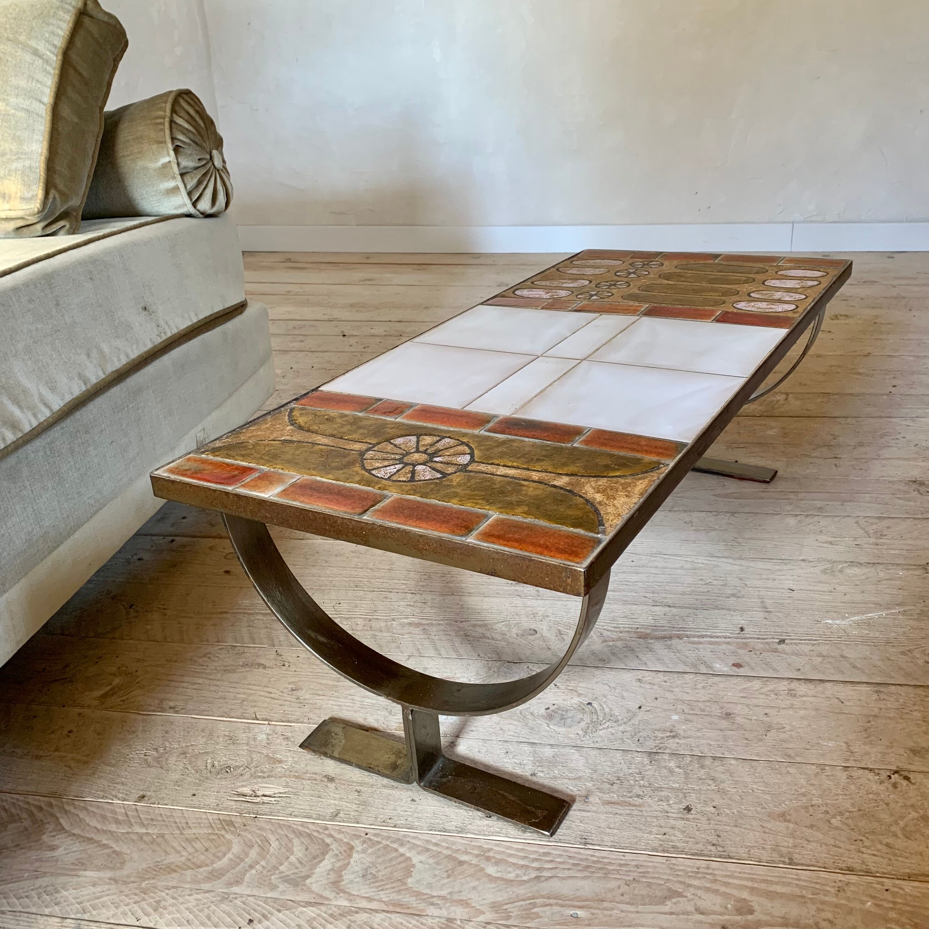 Ceramic coffee table and brushed steel by Jean Gregorieff