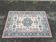 Vintage oriental rug in burgundy red, 133x196cm.