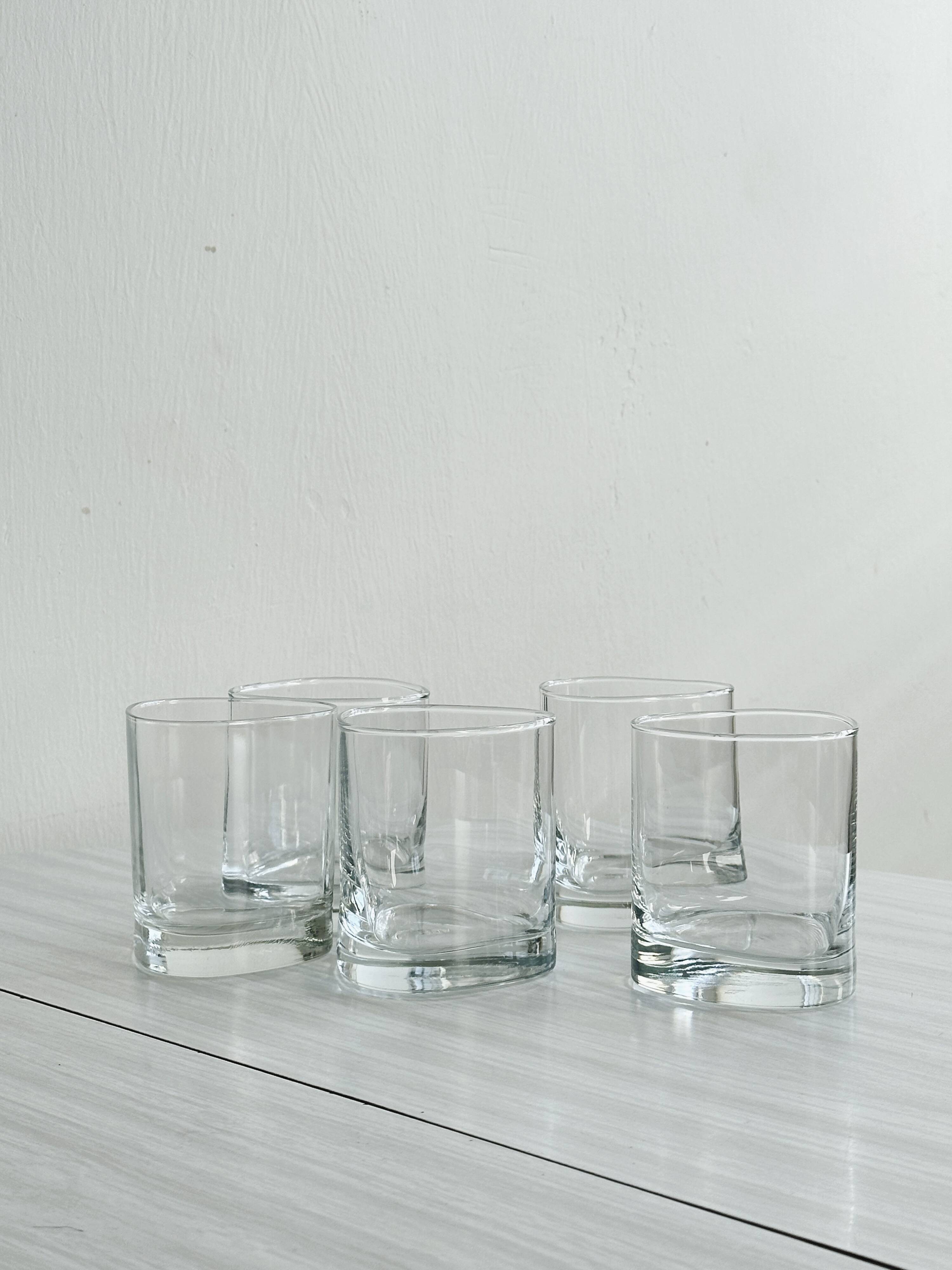 5 whiskey glasses - water.