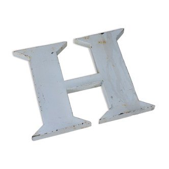 white zinc letter "H"