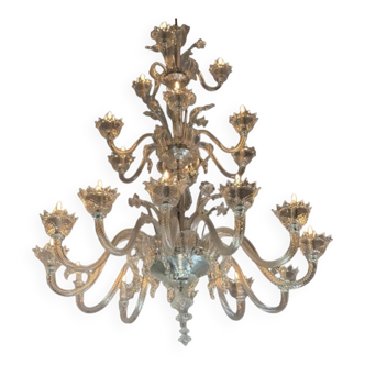 Venetian lustre in colourless Murano glass, 21 light arms on three levels.