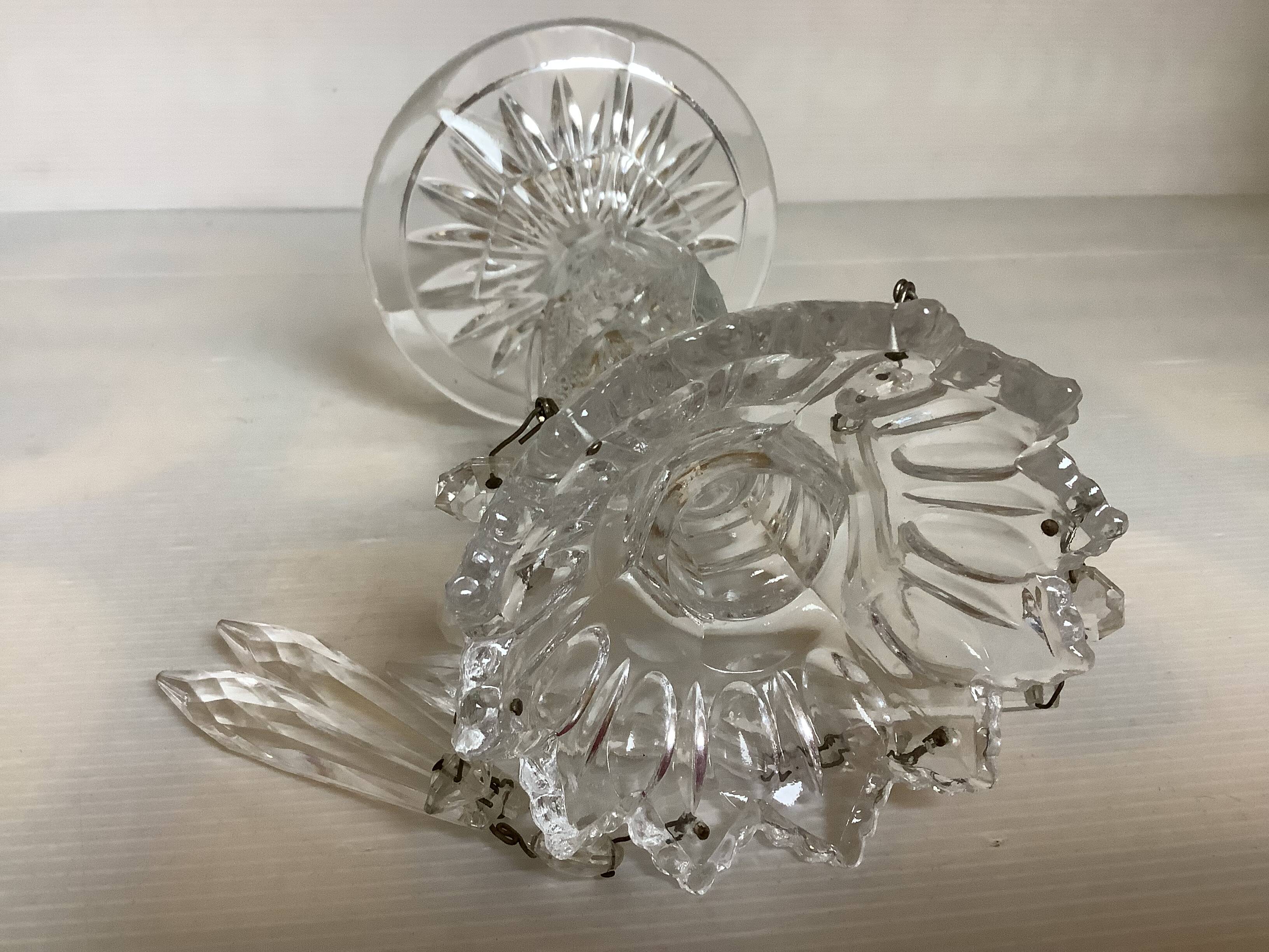 Pineapple candlestick with six glass moulded pendants.