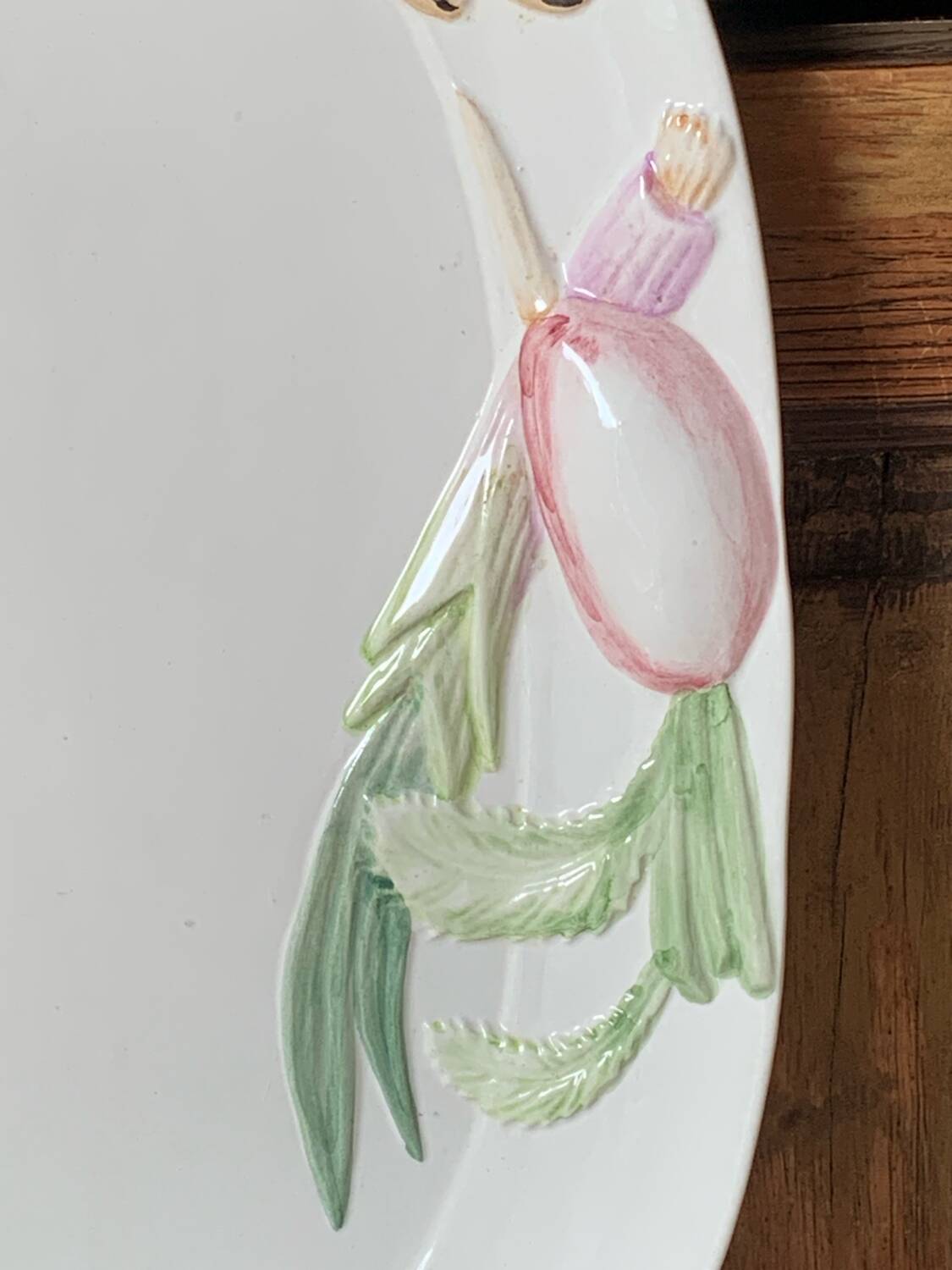 Very large serving dish with hares and vegetables.