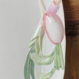 Very large serving dish with hares and vegetables.