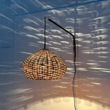 Mid-century modern Danish extendable cantilever wall lamp with a rattan shade, 1960s.