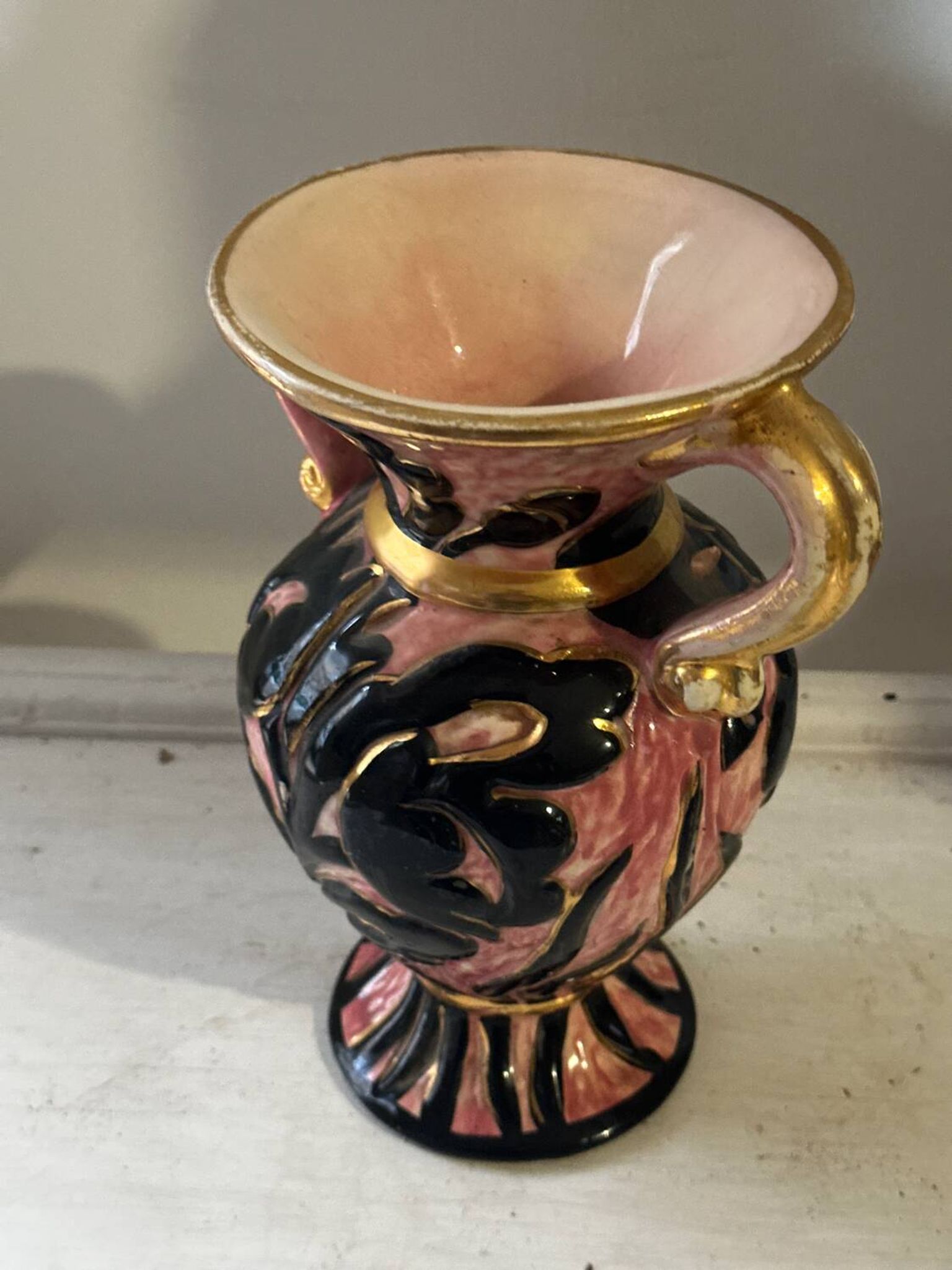Vintage Vallauris vase amphora with relief floral decoration.