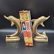 Pair of brass dolphins bookends