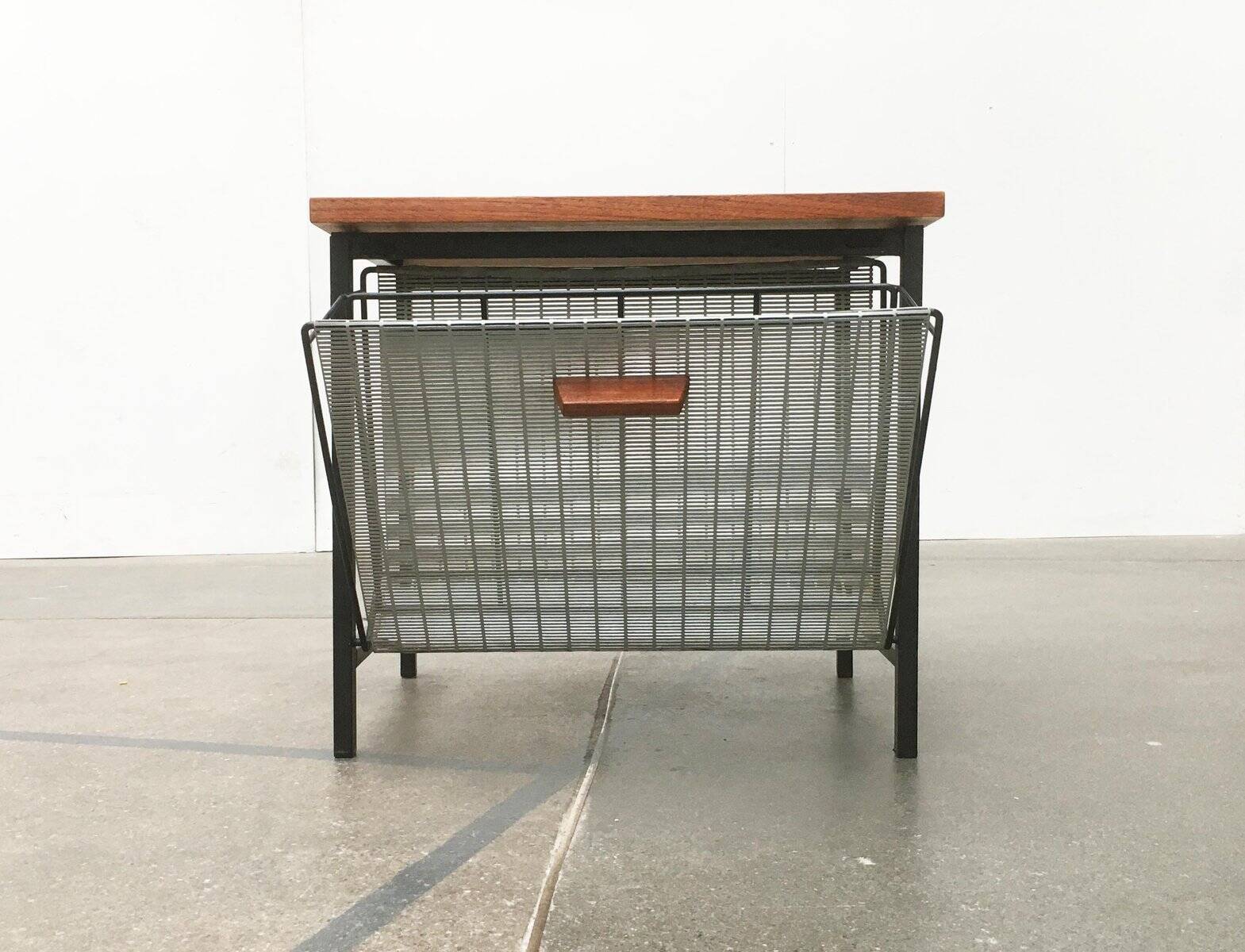 Mid-century teak side table with magazine rack.
