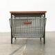 Mid-century teak side table with magazine rack.