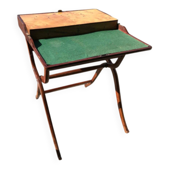 Bracelet holder and antique brown and green fabric watch, vintage 1920s furniture.