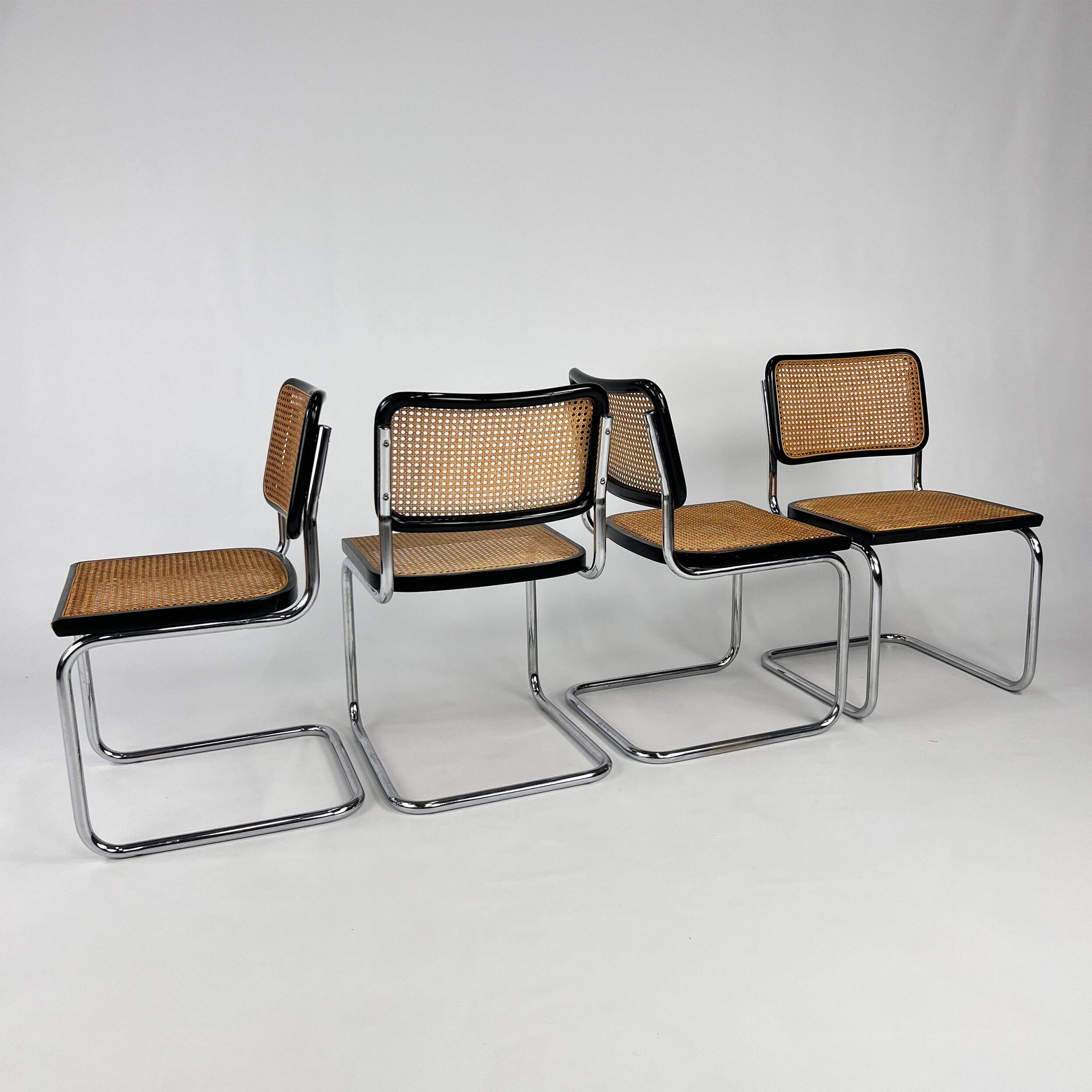 Set of 4 Tubular Frame and Cane Cantilever dining chairs, Italy, 1970s