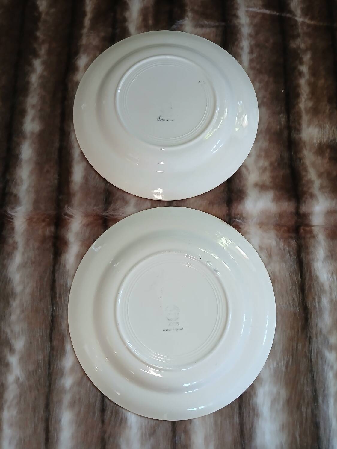 2 old round checkered plates