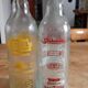 2 bottles of vintage lemonade from the 50s in glass