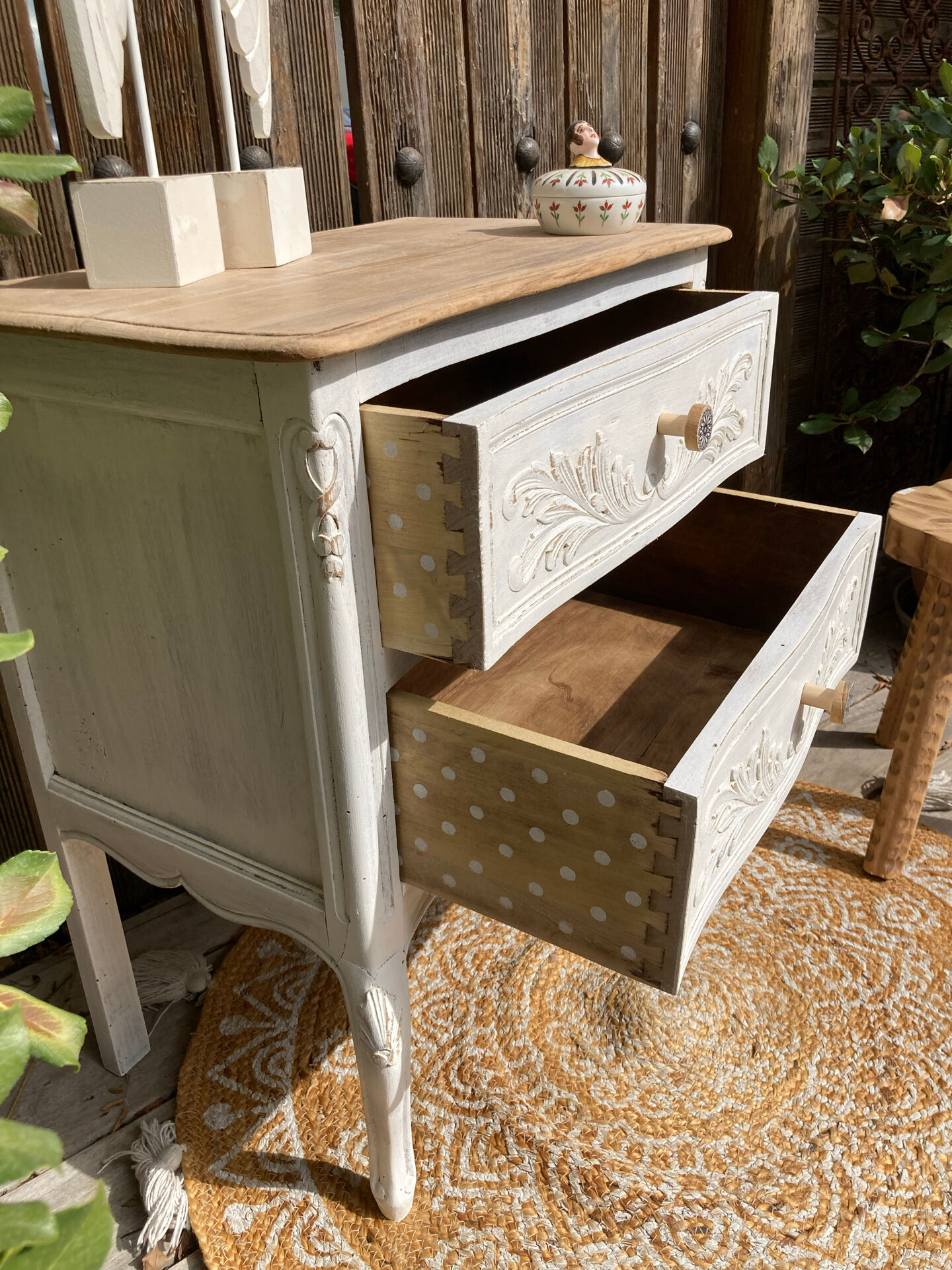 Adorable small chest of drawers or weathered white console.