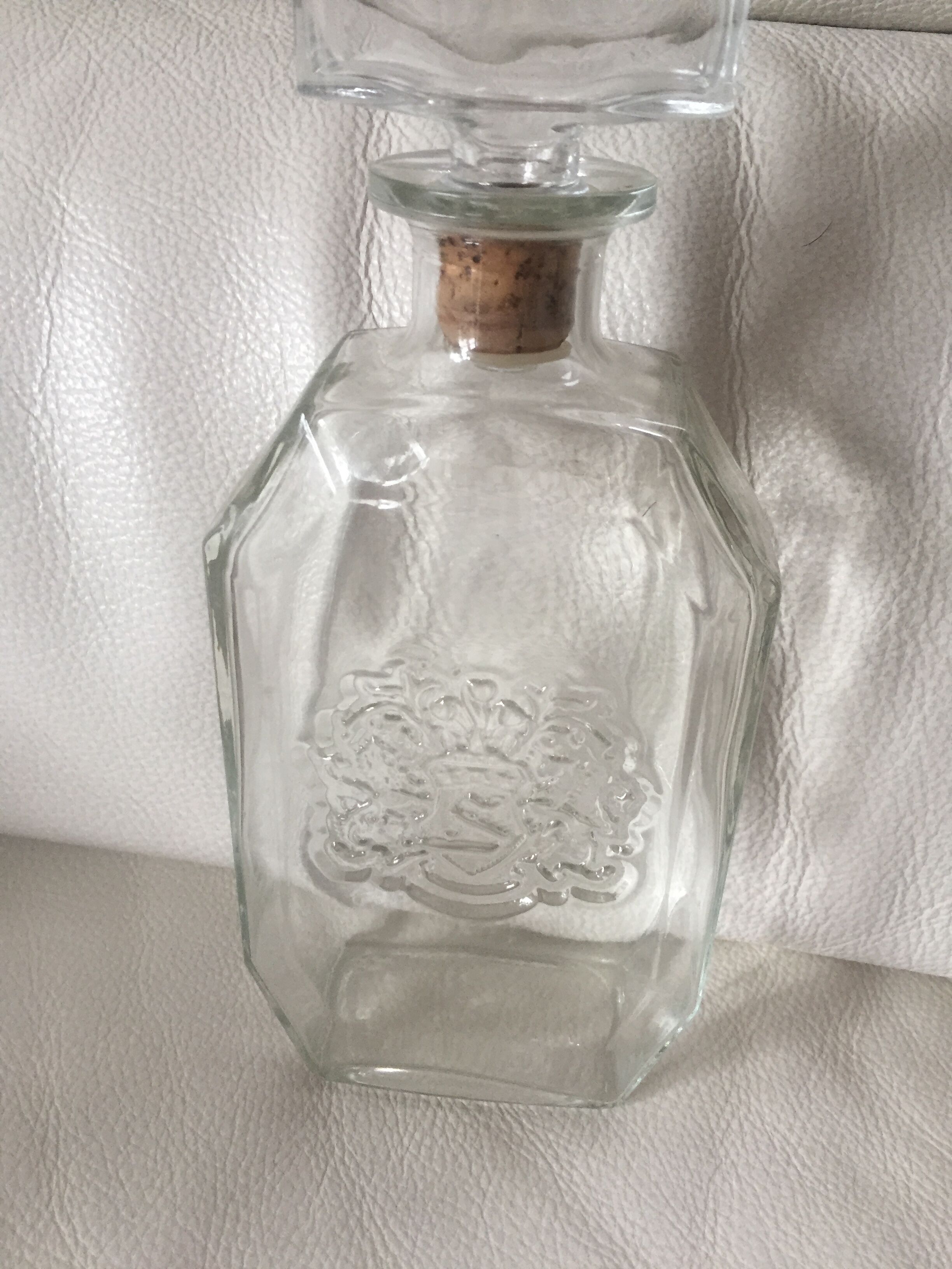 Glass bottle with coat of arms
