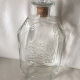 Bouteille verre avec blason