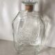 Glass bottle with coat of arms