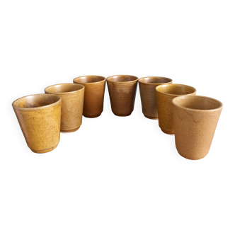 7 Digoin stoneware cups or glasses