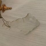 Art deco wall lamp with beveled stamps in gilded brass