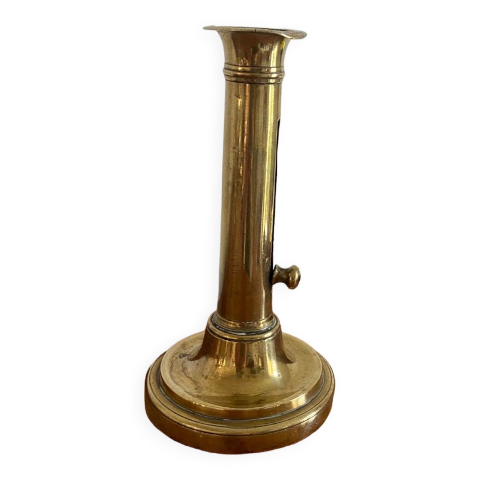 Old brass push candle holder
