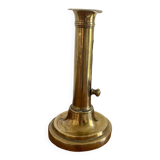 Old brass push candle holder