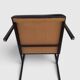 Modernist armchair in black faux leather and metal – 1960s