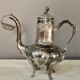 Coffee or tea service monogrammed cr silver metal