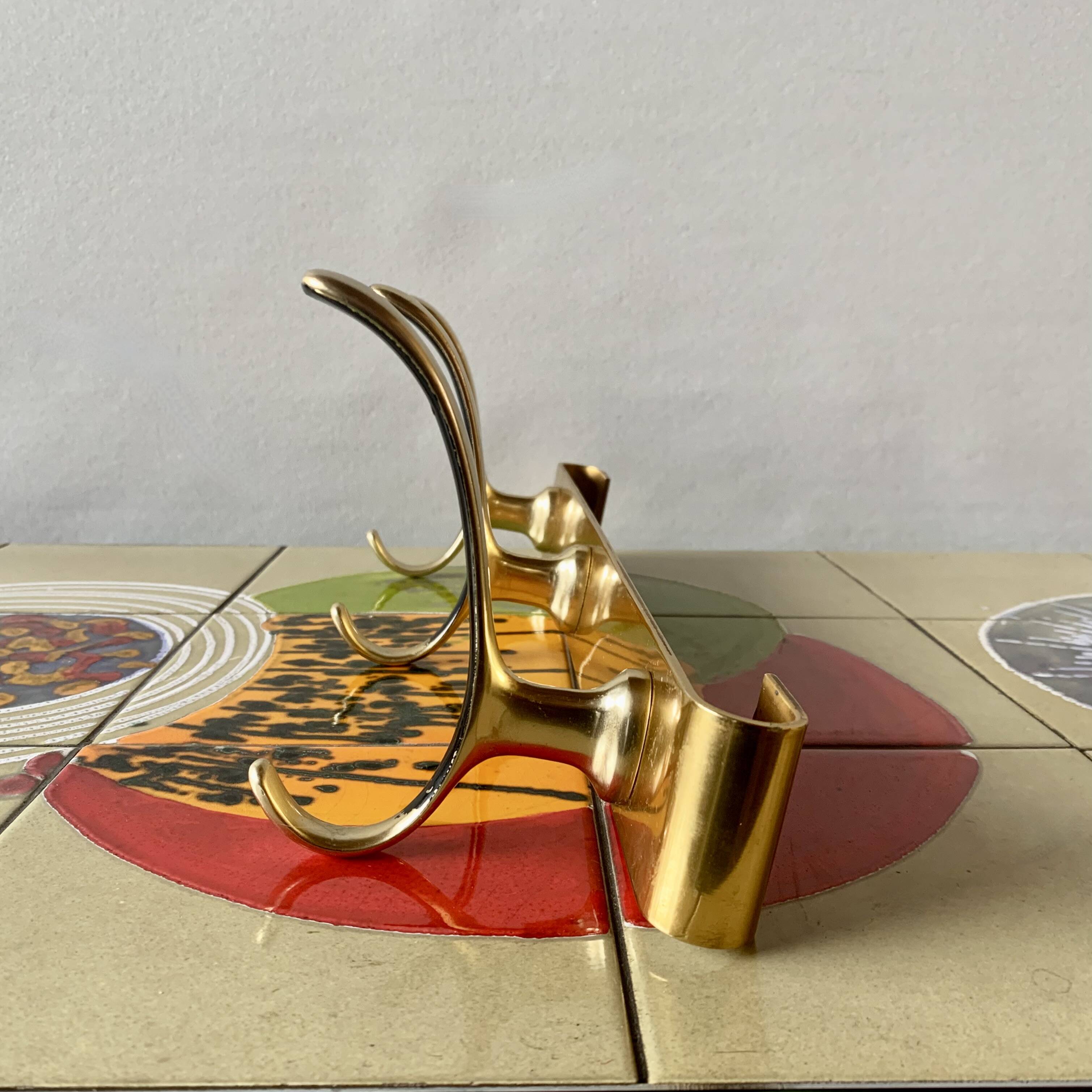 Vintage wall-mounted coat rack in golden aluminum - triple coat hook